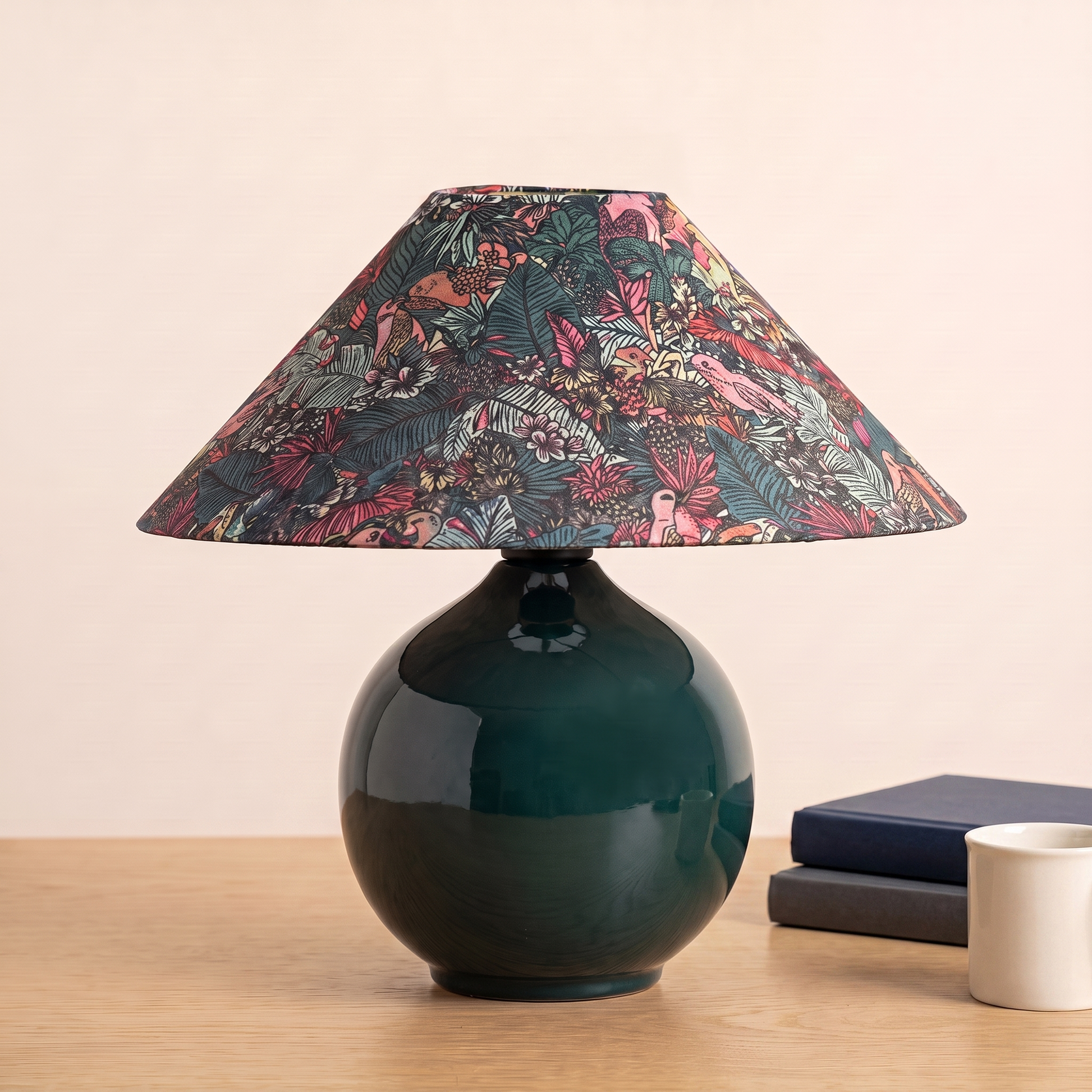 Kalinda Table Lamp beside books and a mug to show its size