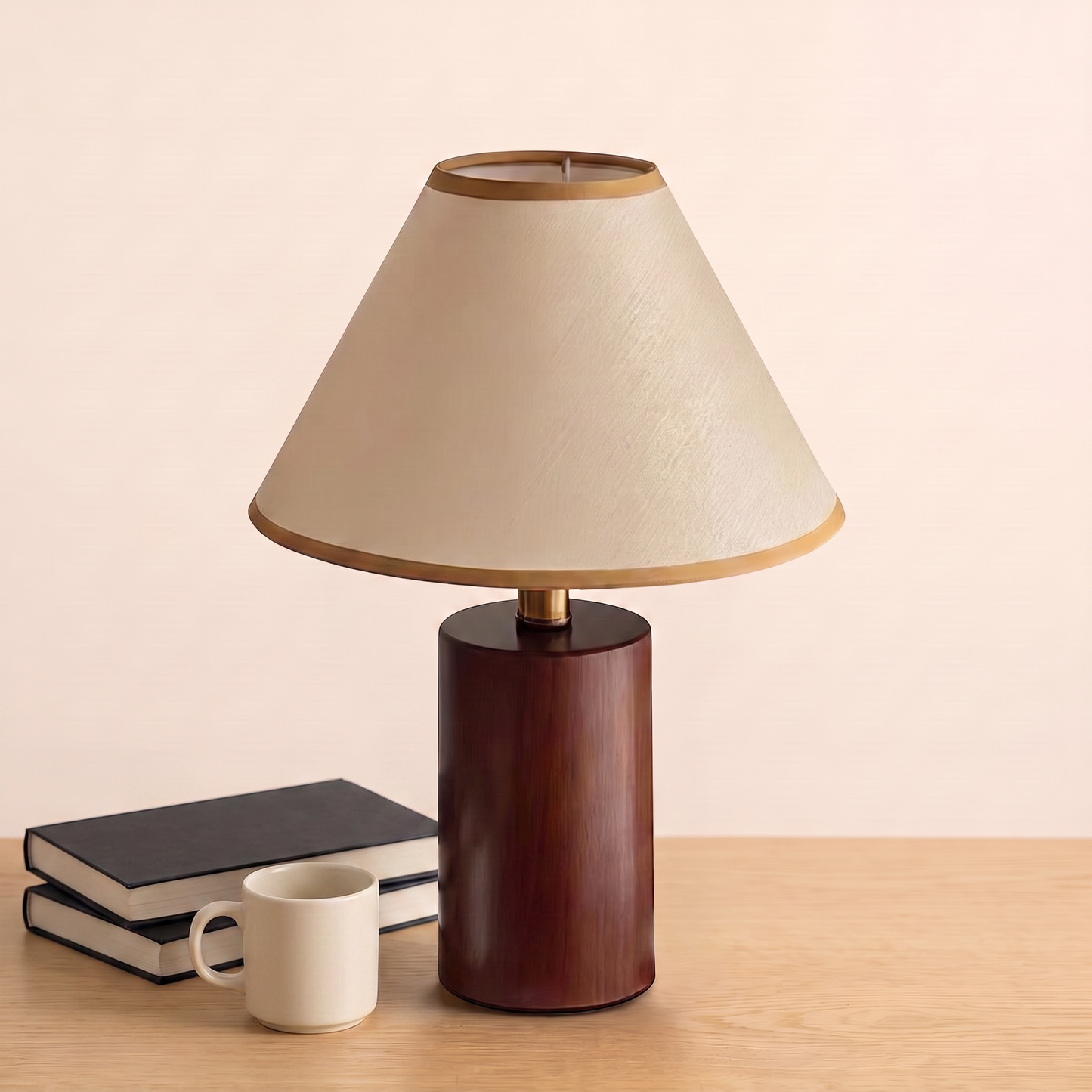 Martin Table Lamp beside books and a mug to show its size