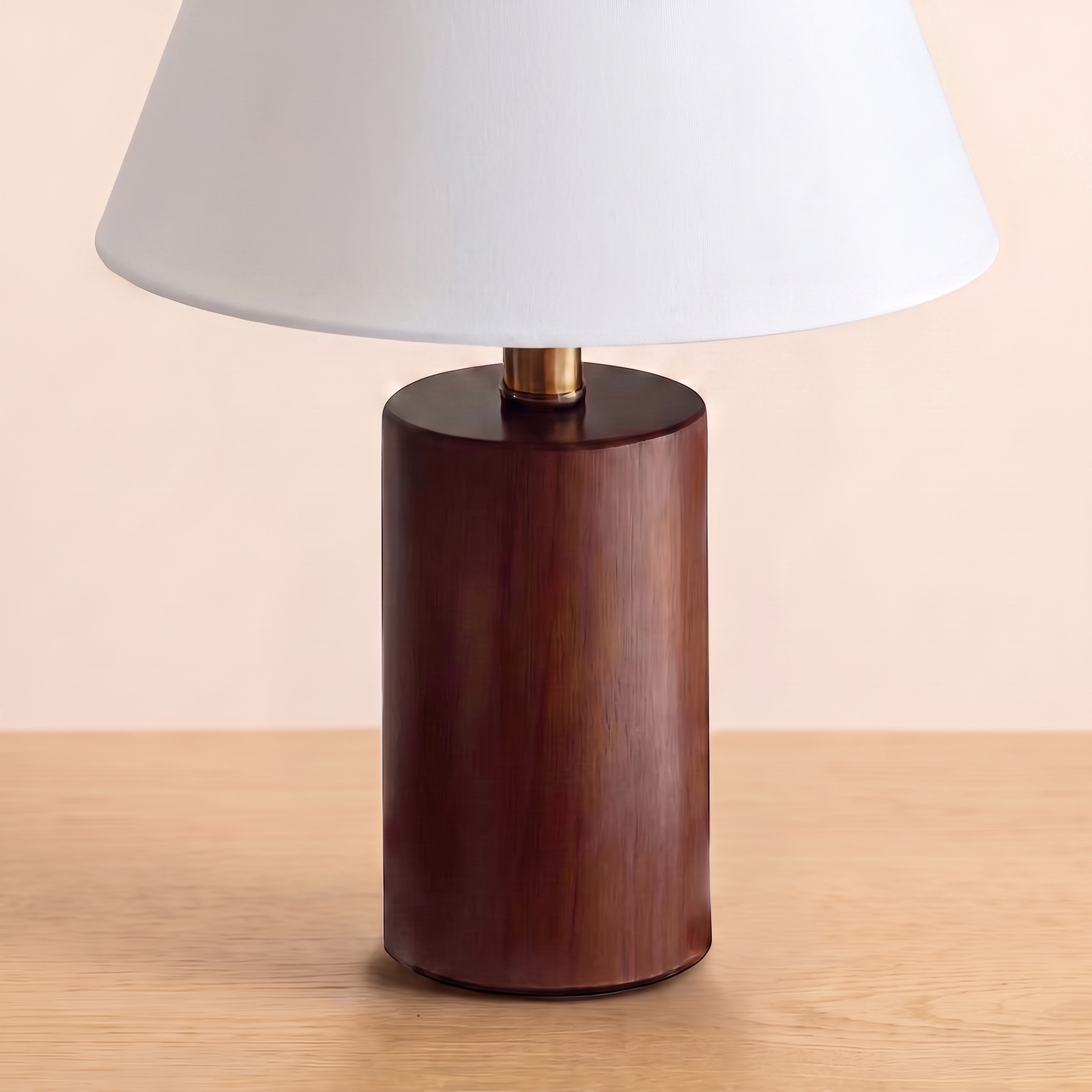 Close up of the turned wood base under the white shade