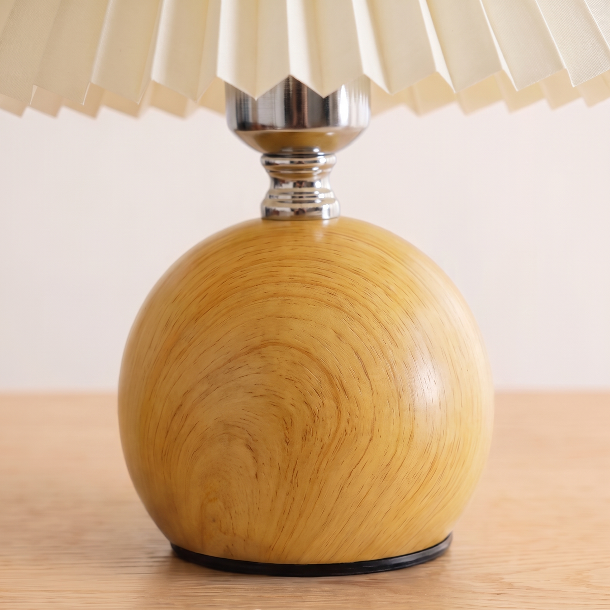 Close up of the rubberwood base and the pleated shade edge