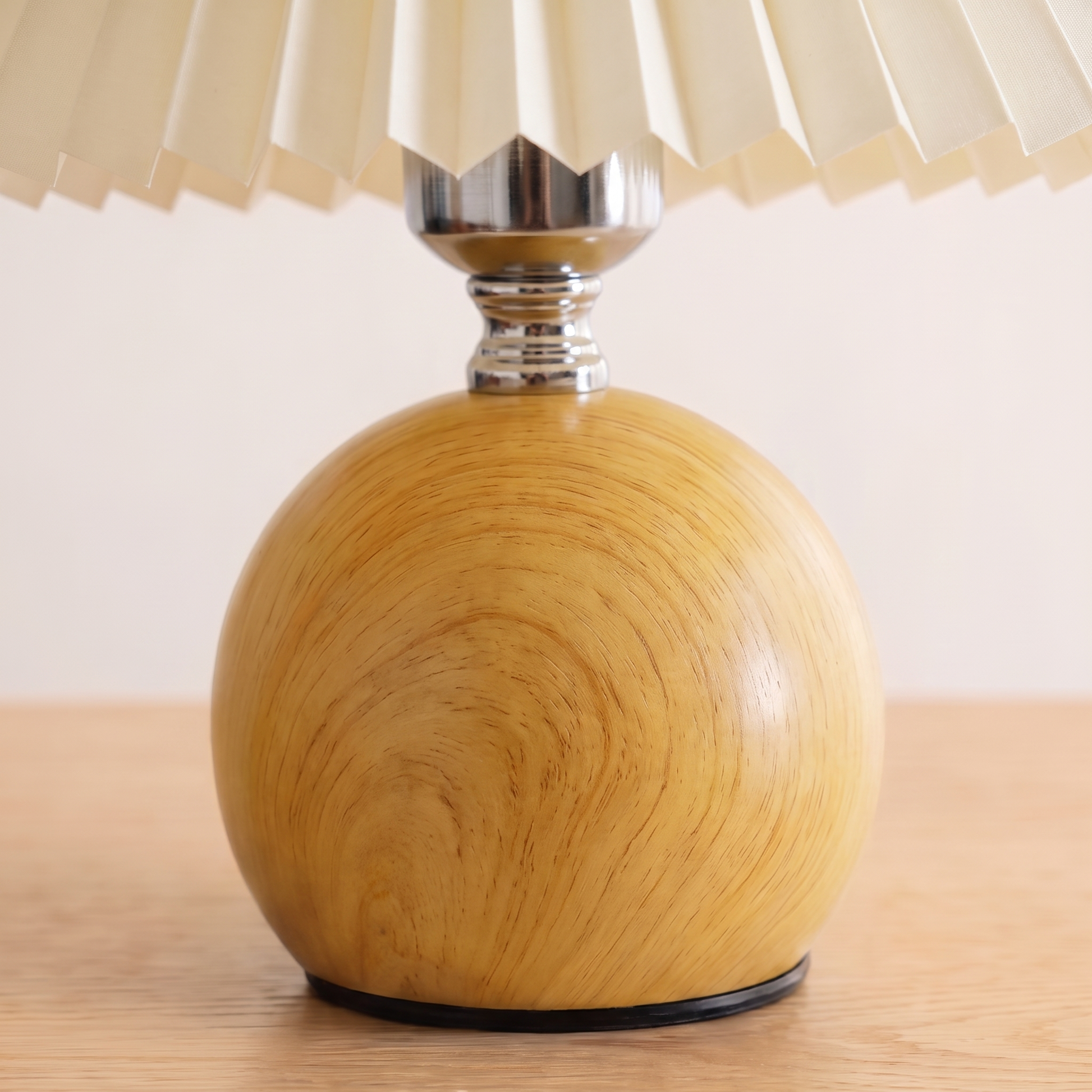 Close up of the rubberwood base and the pleated shade edge