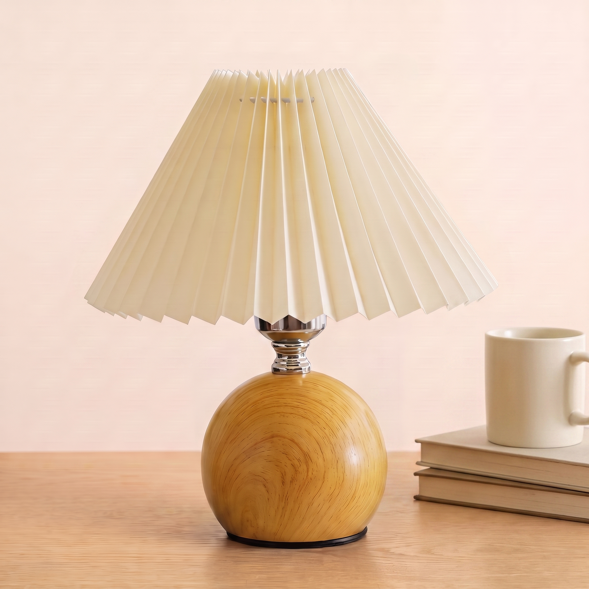 Retro Nordic Pleated Table Lamp, rubberwood base, beside books and a mug to show its size