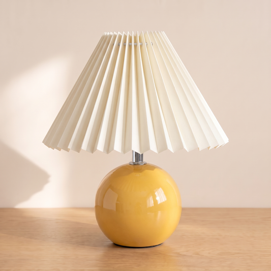 Nordic Ceramic Table Lamp with the cream ceramic base and off-white pleated shade