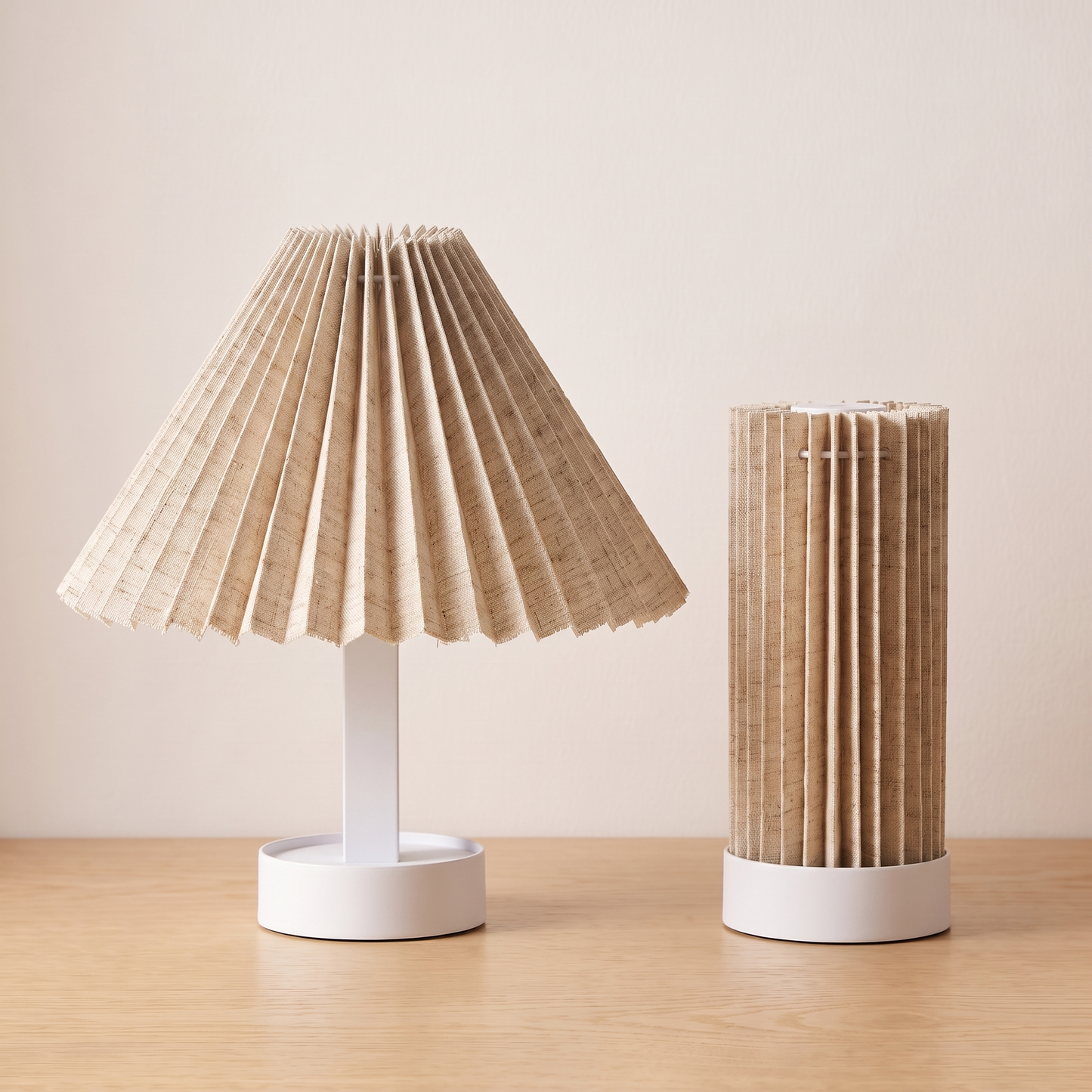The same lamp shown in both shapes, opened out as a table lamp and folded down into a slim lantern